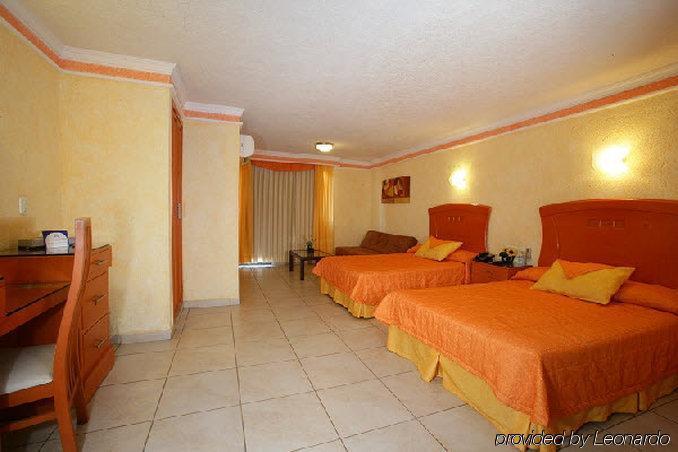Hotel Puerta Del Sol Guadalajara Сапопан Номер фото